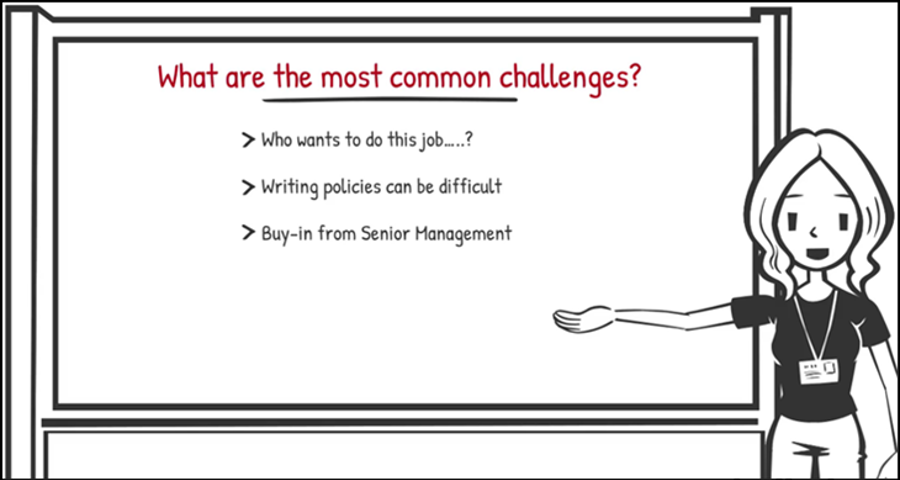 Cartoon woman presenting a video - The challenges of developing, delivering, and maintaining IT policies 